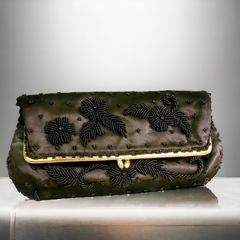 Beaded black fold over clutch bag